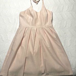 Beautiful formal halter dress with bow at top around neck. Light pink. Size 10.